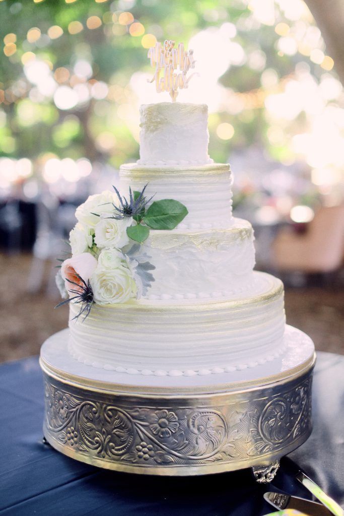 4 tier white wedding cake on I Said Yes!