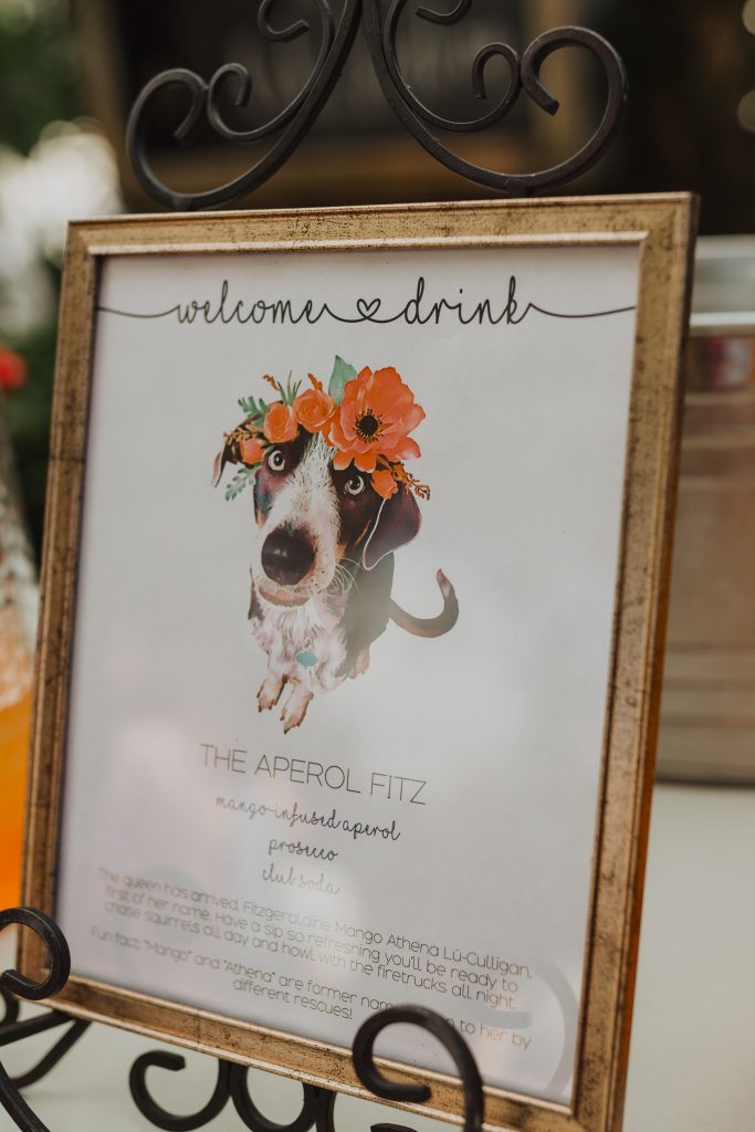 couples pet used as image on sign for wedding