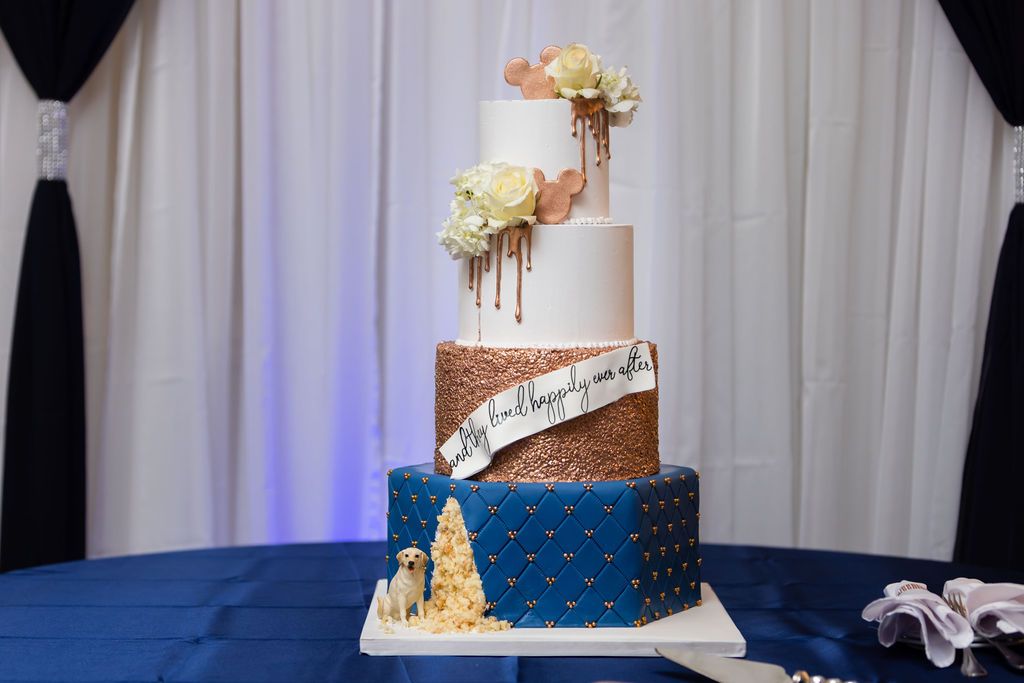 navy blue and rose gold 3 tier wedding cake