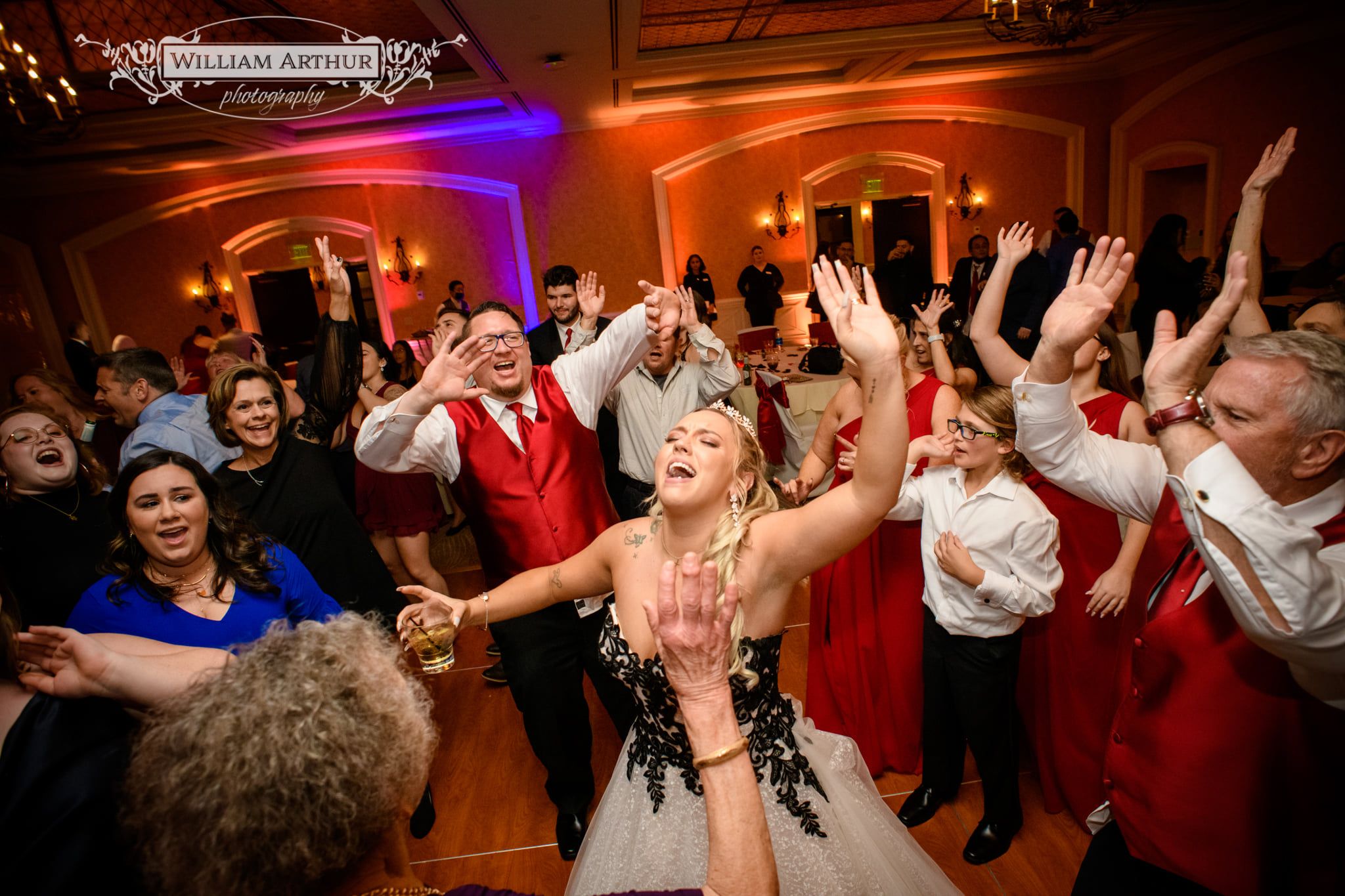 Video: Another groom really goes in on his bride during garter removal at  their wedding reception