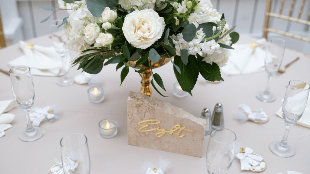 white and greenery wedding centerpieces at Pegasus Manor