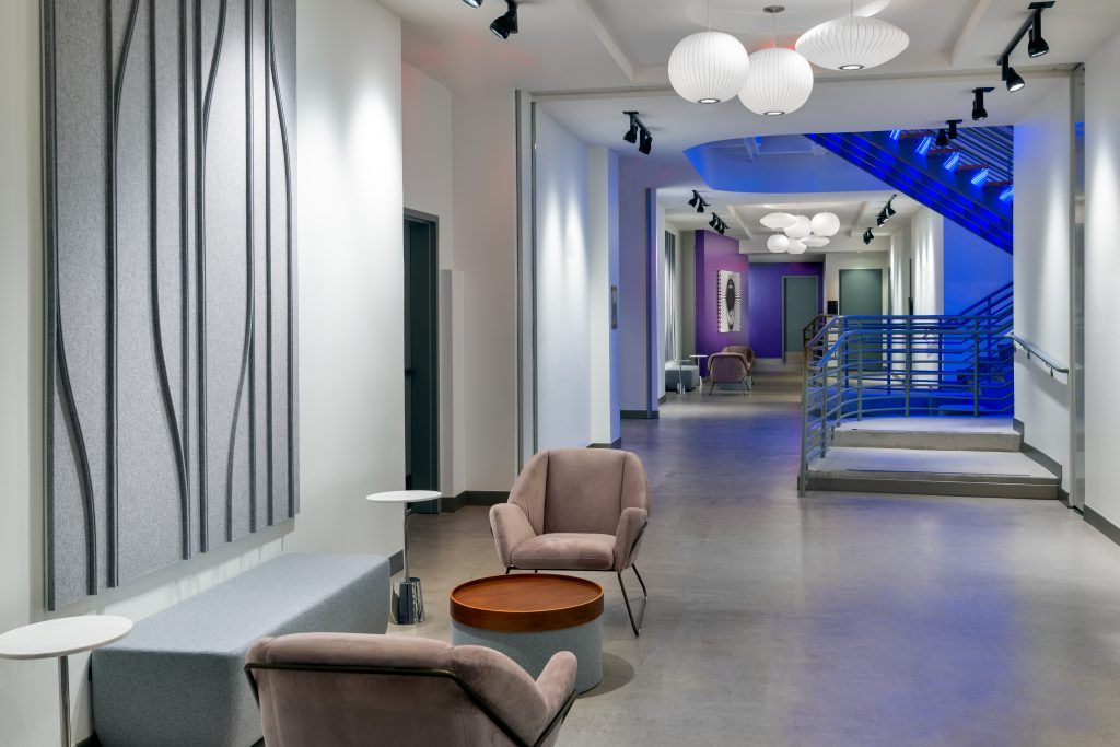Stylish pre-function area at Aloft Orlando Downtown featuring modern seating and décor, a versatile space for Orlando wedding venue gatherings