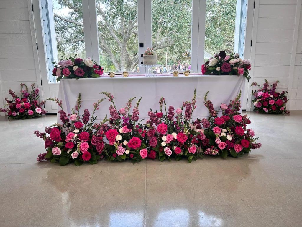 shades of pink wedding floral arrangements by jill heaton event decor on i said yes! fl