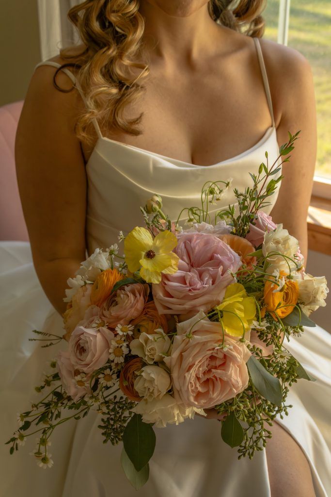 Close up of bride and bridal bouquet by Christina Foulds Photography, Orlando & Central Florida wedding photographer