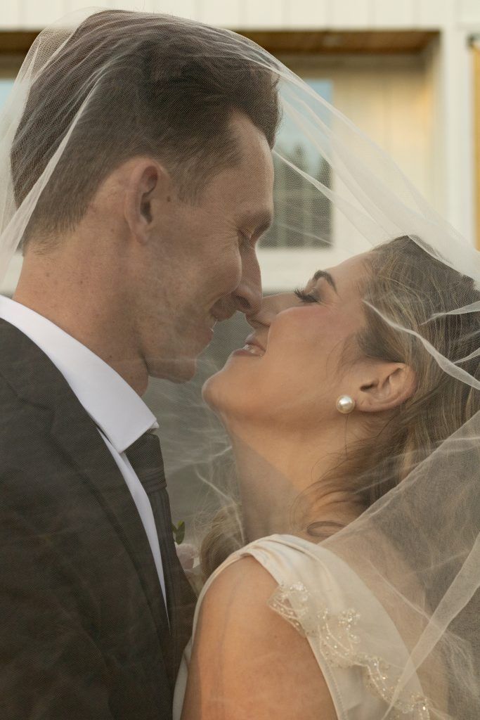 Close up of bride and groom about to kiss captured by Christina Foulds Photography, Orlando & Central Florida wedding photographer