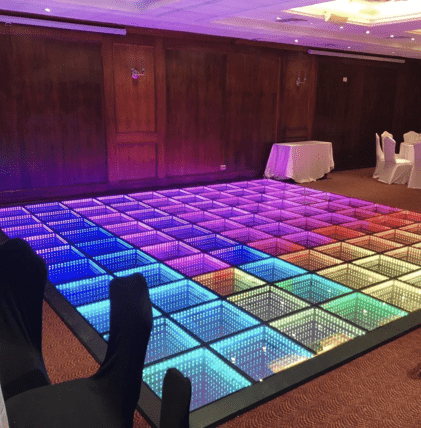 Grid style underlit dance floor with colorful squares