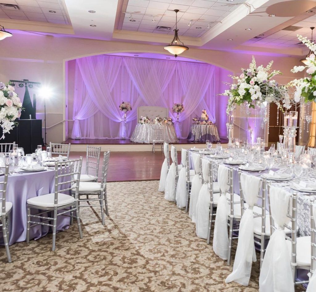 Lavender and white wedding with white draping
