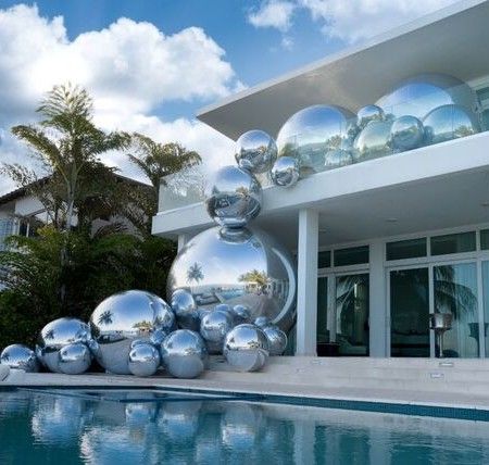 Small to Giant, Silver Balloons flowing from the upstairs pool deck space to the downstairs pool deck