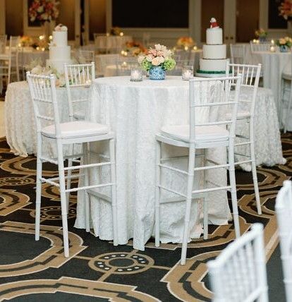 chic, white wedding reception decor by Mel's Events