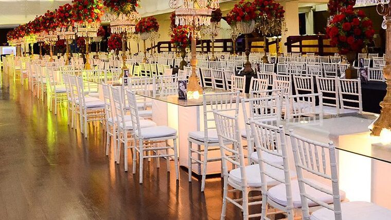 red and white wedding reception centerpieces with gold Eiffel tower stands
