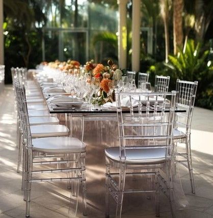 spring, wildflower themed wedding with clear reception chairs